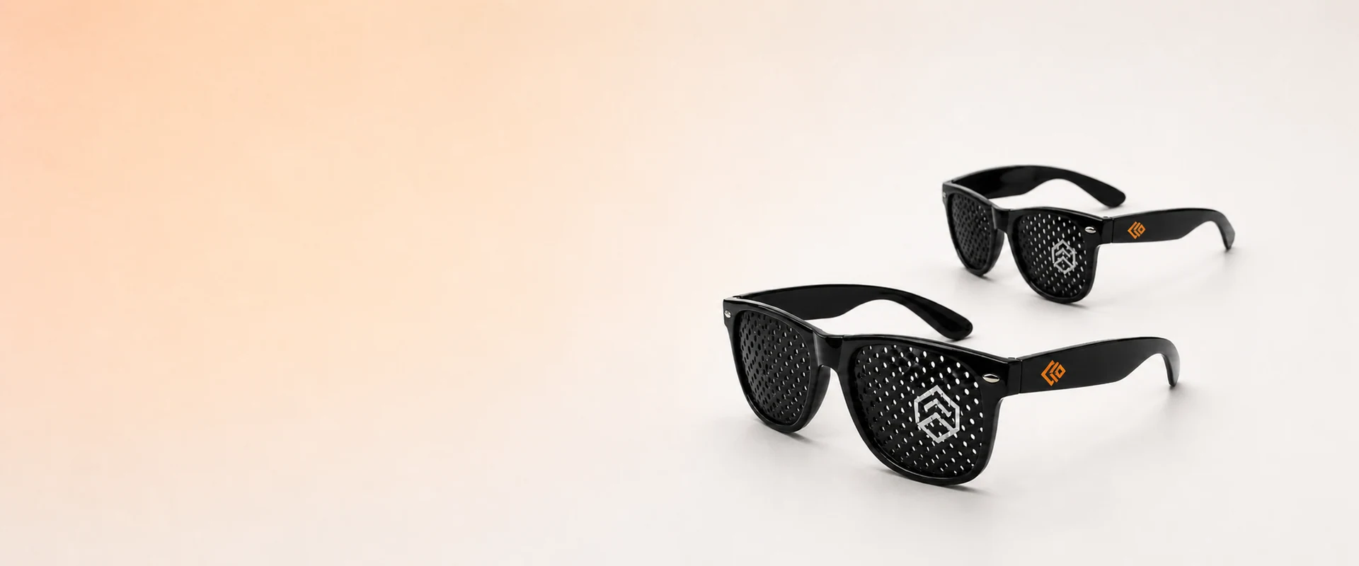 Black custom logo sunglasses showing branding areas on the temples and lenses